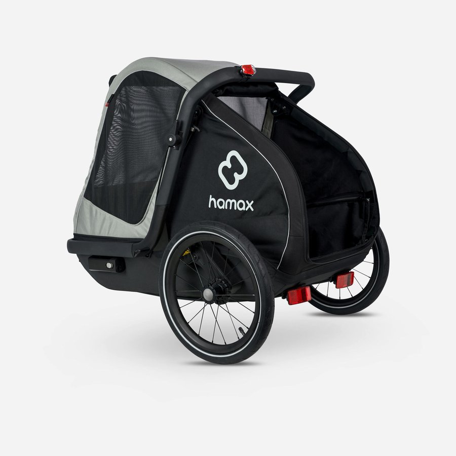 Remorque vélo chien Hamax Cooper noire et grise vue de trois quarts, avec roues de 16 pouces